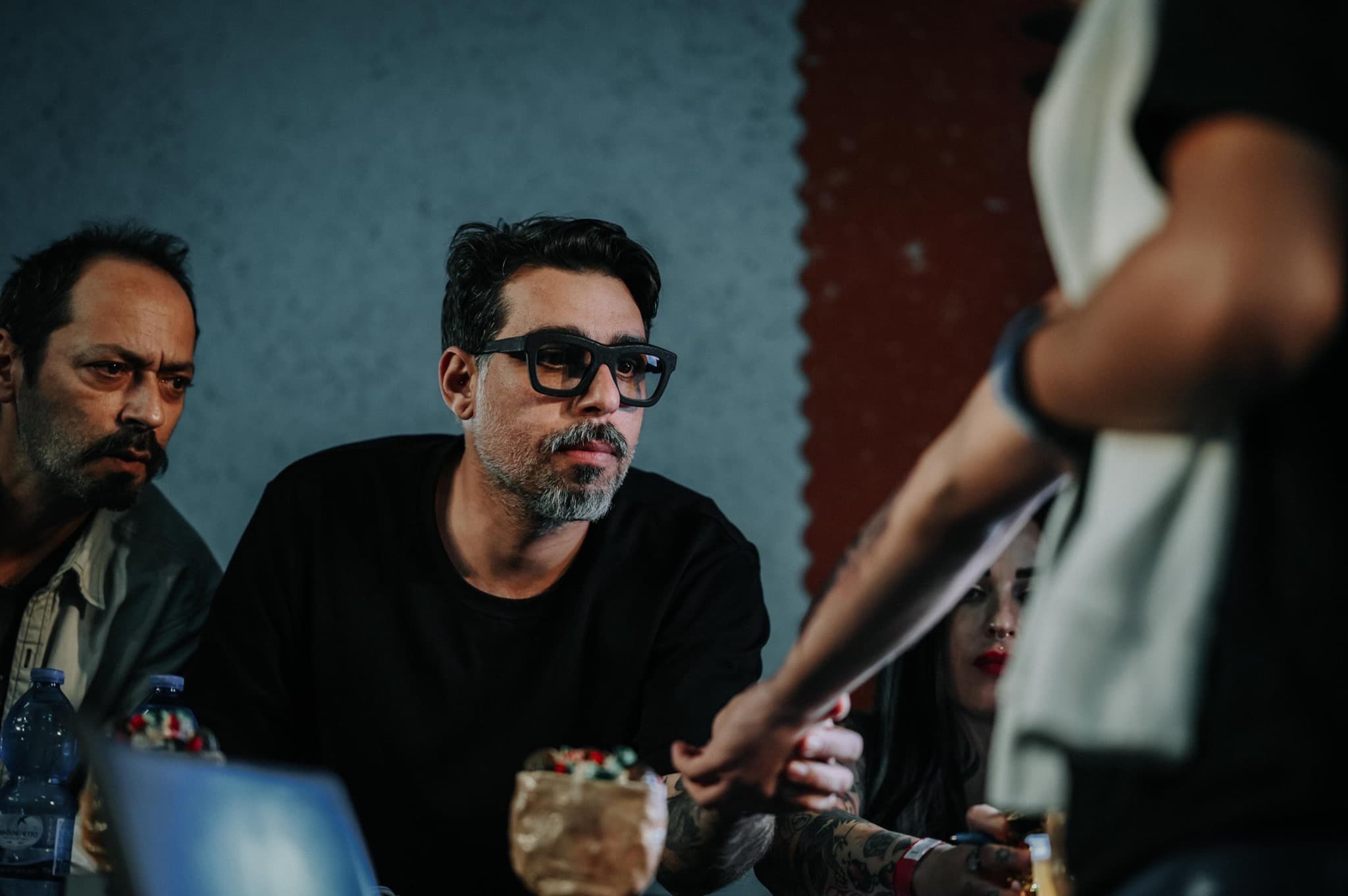 Chaim Machlev judging a tattoo competition